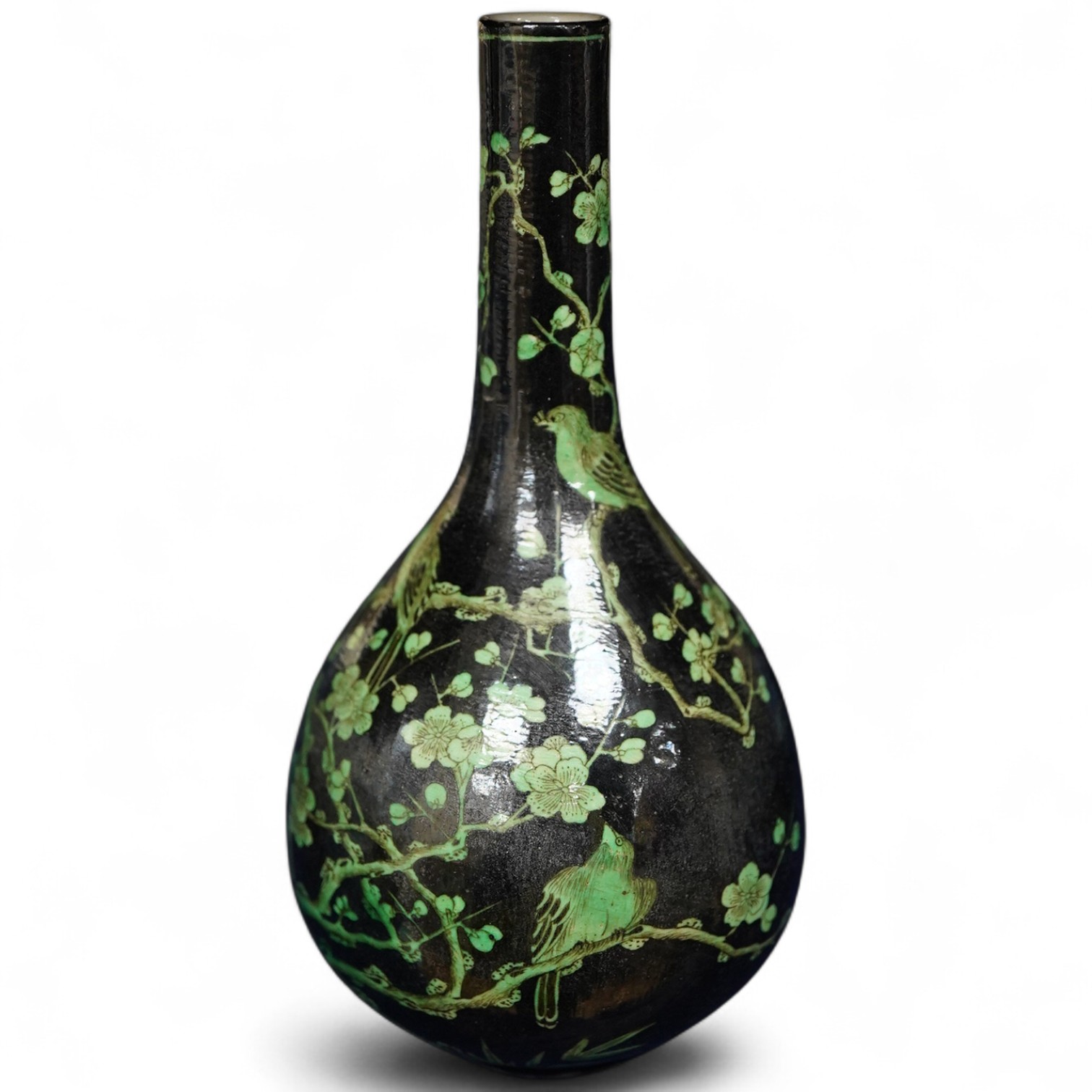 A Chinese famille noire bottle vase, 17cm high